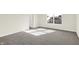 Well-lit bedroom with grey carpet and a view from the window at 19663 Atwater Ave, Sheridan, IN 46069