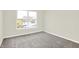 Spacious bedroom with grey carpet and large window at 19663 Atwater Ave, Sheridan, IN 46069