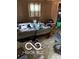 A cluttered bedroom with two mattresses and various debris on the floor at 2901 S Taft Ave, Indianapolis, IN 46241