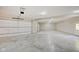 Spacious three-car garage with polished concrete floor at 3621 Olive Branch Rd, Greenwood, IN 46143