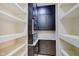 Well-equipped pantry with ample shelving and built-in microwave at 3621 Olive Branch Rd, Greenwood, IN 46143