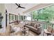 Relaxing covered patio with seating area and access to the backyard at 3621 Olive Branch Rd, Greenwood, IN 46143