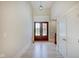 Light and airy entryway with double doors and hardwood floors at 3621 Olive Branch Rd, Greenwood, IN 46143