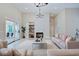 Spacious living room with a fireplace and access to a deck at 3621 Olive Branch Rd, Greenwood, IN 46143