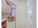 Convenient laundry room with built-in cabinetry and granite countertops at 3621 Olive Branch Rd, Greenwood, IN 46143