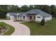 Luxury home exterior showcasing modern design elements at 3621 Olive Branch Rd, Greenwood, IN 46143