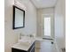 Modern bathroom with a floating vanity and a frameless mirror at 3621 Olive Branch Rd, Greenwood, IN 46143