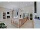 Modern kitchen with large island and high-end appliances at 3621 Olive Branch Rd, Greenwood, IN 46143