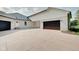View of two-car garage with modern finishes at 3621 Olive Branch Rd, Greenwood, IN 46143