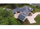 Bird's-eye view of the house, highlighting its layout, landscaping, and driveway at 3621 Olive Branch Rd, Greenwood, IN 46143