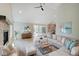Open living room showcasing a sectional sofa and a view of the kitchen at 3621 Olive Branch Rd, Greenwood, IN 46143