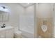 Modern bathroom with a shower, toilet, and urinal at 3621 Olive Branch Rd, Greenwood, IN 46143