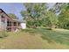 Spacious backyard with lush lawn and a view of the pool at 3621 Olive Branch Rd, Greenwood, IN 46143
