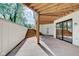 Covered patio with stairs, providing outdoor entertaining space at 3621 Olive Branch Rd, Greenwood, IN 46143