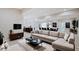 Finished basement with open living space, large sectional sofa, and dining area at 3621 Olive Branch Rd, Greenwood, IN 46143