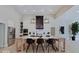 Spacious kitchen with large island and a modern range hood at 3621 Olive Branch Rd, Greenwood, IN 46143