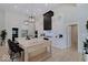 Modern kitchen with white cabinets and a large island at 3621 Olive Branch Rd, Greenwood, IN 46143