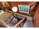 View of wooden staircase with stained glass window at 9307 E Dill Rd, Morgantown, IN 46160