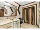 Retro bathroom with vintage vanity and shower at 9307 E Dill Rd, Morgantown, IN 46160