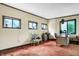 Home office with multiple windows and desk at 9307 E Dill Rd, Morgantown, IN 46160