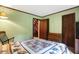 Bedroom with a rocking chair and access to another room at 9307 E Dill Rd, Morgantown, IN 46160