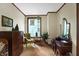 Bedroom with vintage furniture and a large window at 9307 E Dill Rd, Morgantown, IN 46160