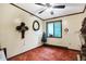Bright bedroom with window and ceiling fan at 9307 E Dill Rd, Morgantown, IN 46160