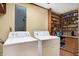 Laundry room with washer, dryer, and ample shelving for storage at 9307 E Dill Rd, Morgantown, IN 46160