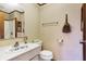 Small bathroom with floral wallpaper and shower at 9307 E Dill Rd, Morgantown, IN 46160