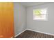 Simple bedroom with hardwood floors and neutral decor at 975 Rolling Hill Rd, Greenwood, IN 46142