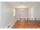 Dining room with a wood table and chandelier at 975 Rolling Hill Rd, Greenwood, IN 46142