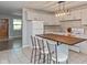 Modern kitchen with white cabinets and a kitchen island at 975 Rolling Hill Rd, Greenwood, IN 46142
