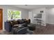 Spacious living room featuring a sectional sofa and stylish coffee table at 975 Rolling Hill Rd, Greenwood, IN 46142