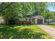 Ranch-style home with brick and siding, featuring a one-car garage at 975 Rolling Hill Rd, Greenwood, IN 46142