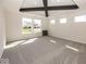 Bright bedroom with grey carpet and large windows at 9227 Brookview Ave, McCordsville, IN 46055
