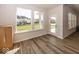 Sunroom with door to backyard and plenty of natural light at 9227 Brookview Ave, McCordsville, IN 46055