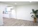 Open concept dining area with arched entry to kitchen at 4126 W 30Th St, Indianapolis, IN 46222