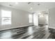 Spacious bedroom with wood-look floors and access to a balcony at 441 W 86Th St, Indianapolis, IN 46260
