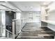 Spacious loft area with built-in shelves and hardwood floors at 441 W 86Th St, Indianapolis, IN 46260