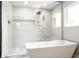 Spa-like bathroom with a soaking tub and walk-in shower at 441 W 86Th St, Indianapolis, IN 46260