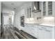 White kitchen with stainless steel appliances and ample counter space at 441 W 86Th St, Indianapolis, IN 46260