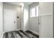 Laundry room with a door, built-in cabinets and window at 441 W 86Th St, Indianapolis, IN 46260