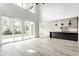 Bright living room with high ceilings, sliding glass doors, and hardwood floors at 441 W 86Th St, Indianapolis, IN 46260
