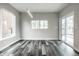 Bright dining room with hardwood floors and sliding glass doors at 441 W 86Th St, Indianapolis, IN 46260