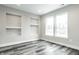 Bright home office with hardwood floors and built-in shelving at 441 W 86Th St, Indianapolis, IN 46260