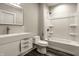 Clean bathroom with a vanity, toilet and bathtub at 441 W 86Th St, Indianapolis, IN 46260