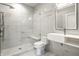 Modern bathroom with a walk-in shower and floating vanity at 441 W 86Th St, Indianapolis, IN 46260
