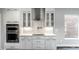 White kitchen with stainless steel appliances and shaker cabinets at 441 W 86Th St, Indianapolis, IN 46260