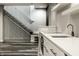 Basement kitchenette with white cabinets and modern appliances at 441 W 86Th St, Indianapolis, IN 46260