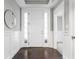 Bright entryway with hardwood floors and white wainscoting at 437 W 86Th St, Indianapolis, IN 46260